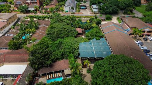 an overhead view of a building with a pool at Luxury Tented Village @ Urban Glamping in St Lucia