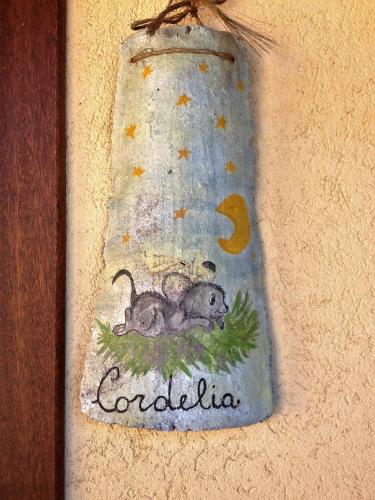 a painting of a mouse in a bottle at Ca di Voi in Calizzano