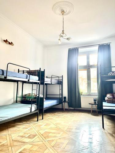 Postel nebo postele na pokoji v ubytování Hostel UNO