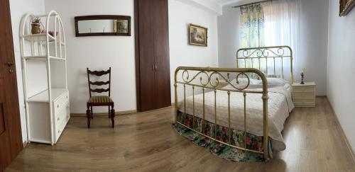 Łóżko lub łóżka w pokoju w obiekcie Pod Katedrą