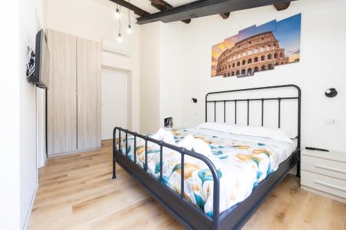 Ένα ή περισσότερα κρεβάτια σε δωμάτιο στο Termini Roma Imperiale