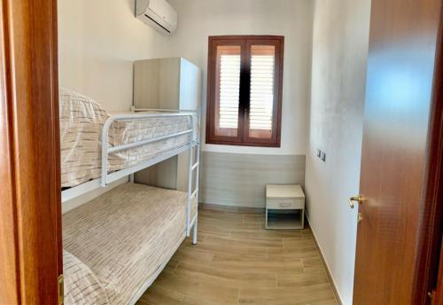Postel nebo postele na pokoji v ubytování Queen House