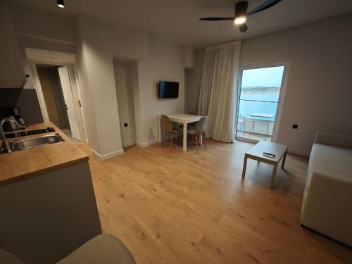 9 Muses Apartmentsにあるテレビまたはエンターテインメントセンター