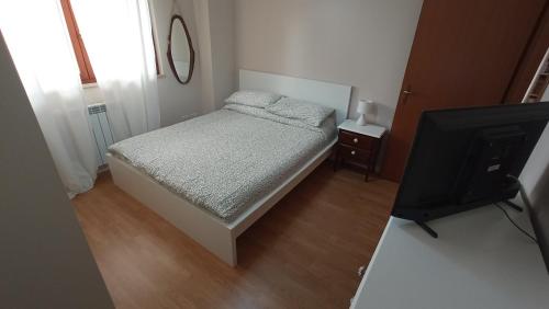 Postel nebo postele na pokoji v ubytování as maison