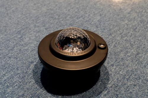 a black object with a ring on top at Fantasy Lodge in Tokyo