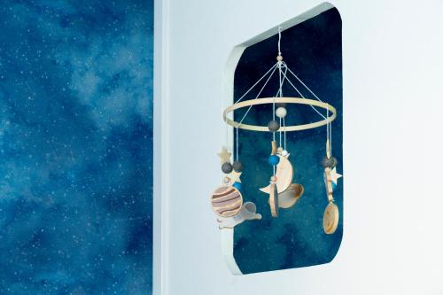a group of ornaments hanging on a wall at Fantasy Lodge in Tokyo