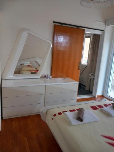 Katil atau katil-katil dalam bilik di Nikos apartment