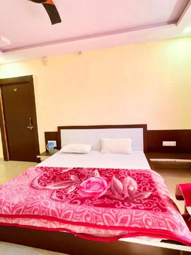 Katil atau katil-katil dalam bilik di Maharaja guest Homestay