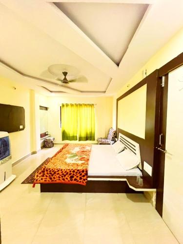 Katil atau katil-katil dalam bilik di Maharaja guest Homestay
