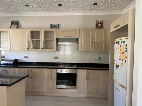 Nhà bếp/bếp nhỏ tại Wales Suite