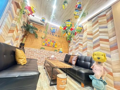 a room with a couch and a table at Hotel Jungle fun fun in Osaka