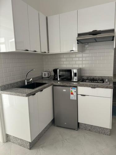 Η κουζίνα ή μικρή κουζίνα στο Chez Ali Apartments