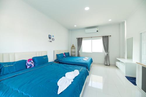 Postel nebo postele na pokoji v ubytování Clear98 Smile Pool Villa Sattahip