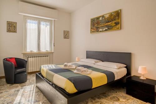Postel nebo postele na pokoji v ubytování Quadri d'Oro - Beachside Escape in Beautiful Liguria