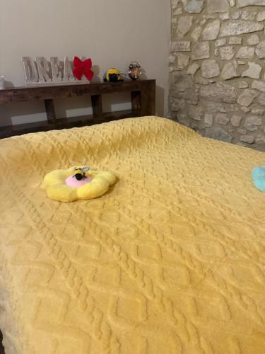 a bed with a banana on top of it at Il Richiamo della Cascata in Papigno