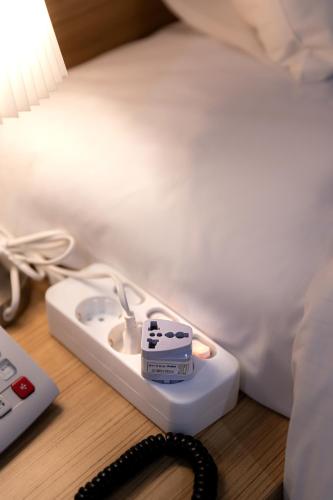 Ένα ή περισσότερα κρεβάτια σε δωμάτιο στο About Stay Seoul