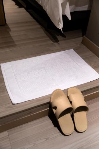 Ένα ή περισσότερα κρεβάτια σε δωμάτιο στο About Stay Seoul