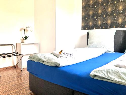 Postel nebo postele na pokoji v ubytování #WORLD Privat Wohnung