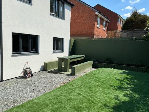 Κήπος έξω από το Cozy Coastal Retreat in Colwyn bay sleeps 8