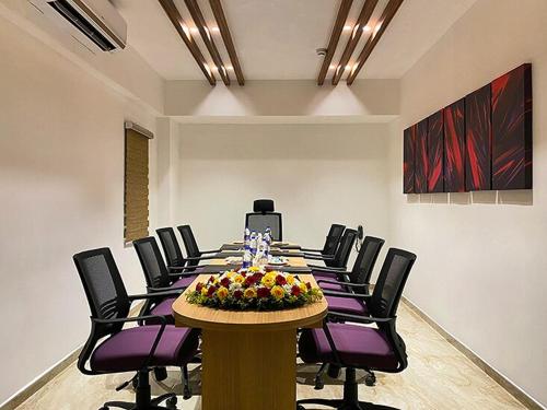 a large conference room with a table and chairs at Park Residency Kodungallur in Trichūr