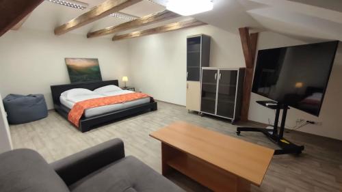 Katil atau katil-katil dalam bilik di Symbiola Apartments