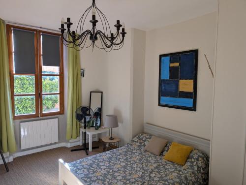 Postel nebo postele na pokoji v ubytování gite au bord du Tarn