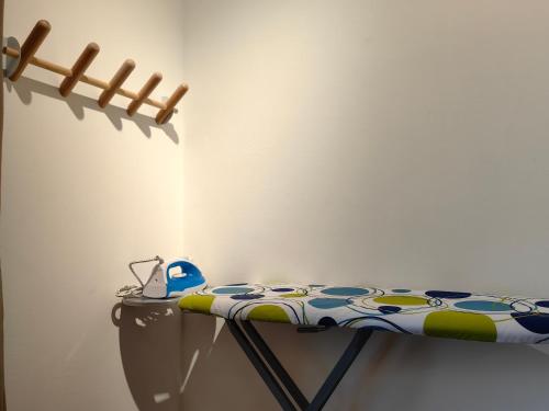 a table in the corner of a room at K Avenue Modern Style Studio (5 Mins to Airport) in Kota Kinabalu