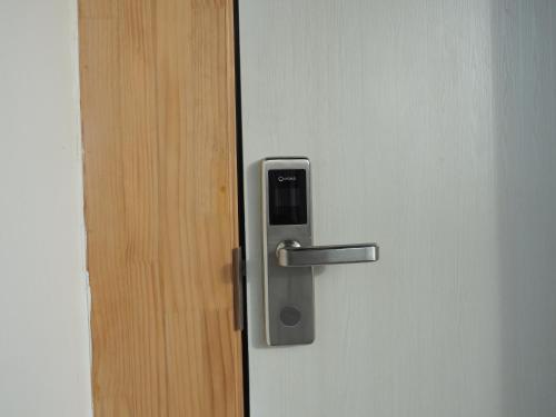 a close up of a door with a handle at Activate C3 Hostel in Phnom Penh