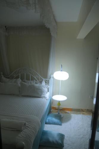 Ένα ή περισσότερα κρεβάτια σε δωμάτιο στο Beautiful Spaces 3 bedroomed bungalow
