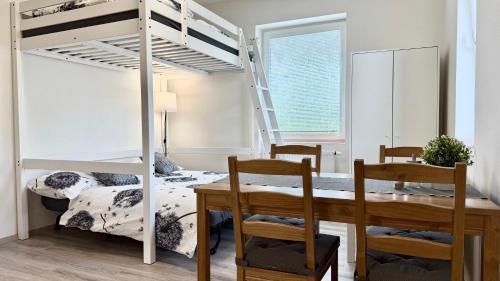 En eller flere senge i et værelse på Za radnicí 6 by Mountain ways