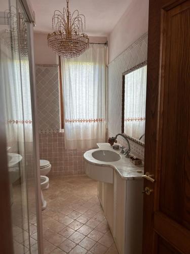 Koupelna v ubytování Villa Dedo