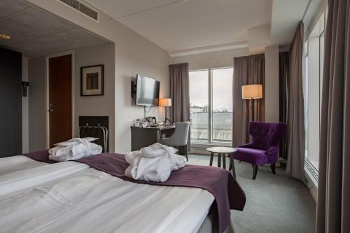 Postel nebo postele na pokoji v ubytování Best Western Plus Hotel Plaza