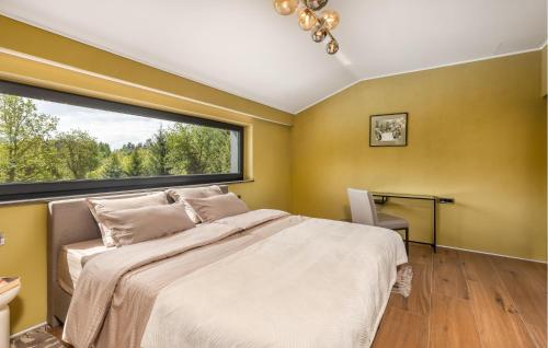 Ένα ή περισσότερα κρεβάτια σε δωμάτιο στο Stunning Home In Slunj