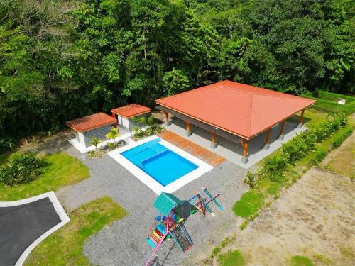 an overhead view of a house with a swimming pool at Casa Cristal # 1 in Fortuna