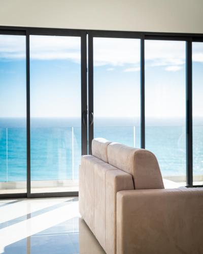 Χώρος καθιστικού στο Appartement vue sur Mer aux portes de Monaco Hôtel Le Roquebrune