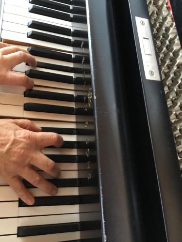 a person playing the piano at Pianoforte holiday apartments in Swakopmund