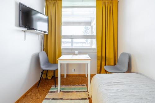 Μια τηλεόραση ή/και κέντρο ψυχαγωγίας στο Bungalow house flat in Rekola 33m2