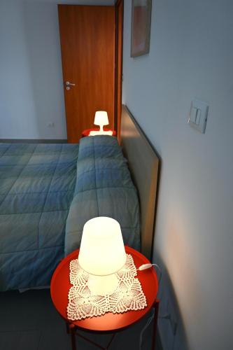 Postel nebo postele na pokoji v ubytování Borgo Tullio, casa vacanze a pochi passi da Udine
