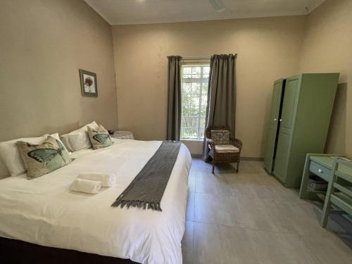 Ένα ή περισσότερα κρεβάτια σε δωμάτιο στο Lord Grey Guesthouse