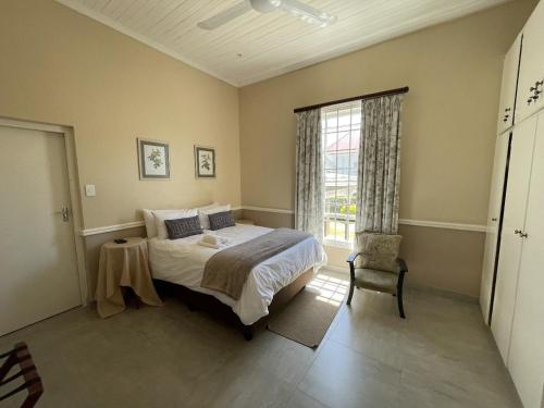 Ένα ή περισσότερα κρεβάτια σε δωμάτιο στο Lord Grey Guesthouse