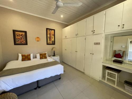 Ένα ή περισσότερα κρεβάτια σε δωμάτιο στο Lord Grey Guesthouse