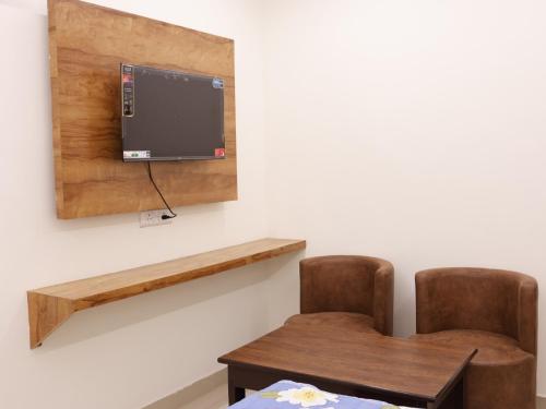 TV a/nebo společenská místnost v ubytování Hotel Budget Inn