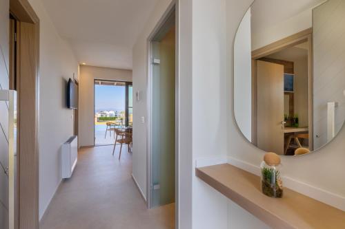 a hallway of a house with a mirror at Casa Tierra - Villa I in Kos Town