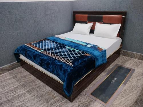 a rendering of a bed in a room at Hotel Shyalik Palace in Uttarkāshi