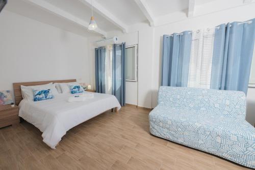Ένα ή περισσότερα κρεβάτια σε δωμάτιο στο Casa Esperanza