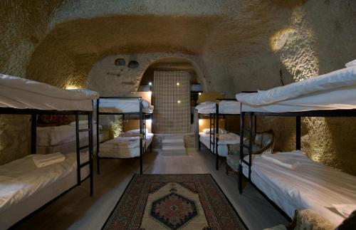 Postel nebo postele na pokoji v ubytování Center cave hostel