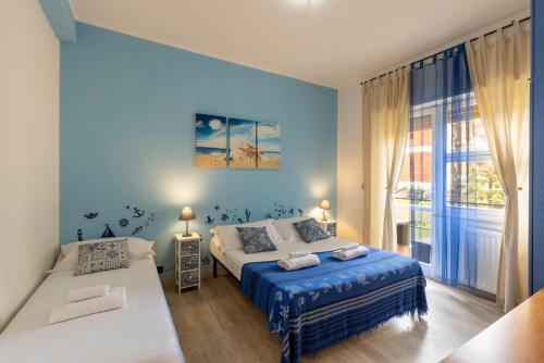 Ένα ή περισσότερα κρεβάτια σε δωμάτιο στο Il Sole di Serapo