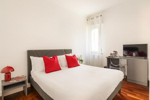 Ένα ή περισσότερα κρεβάτια σε δωμάτιο στο YourHome - Villa Sorrento