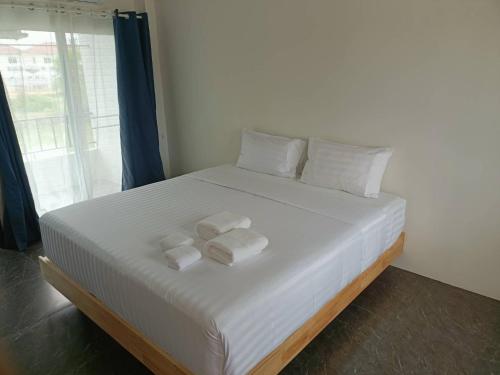 Postel nebo postele na pokoji v ubytování Comfy Hotels Suvarnabhumi Airport