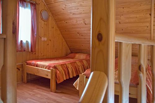 Postel nebo postele na pokoji v ubytování Càmping Riera Merlès